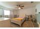 Bright bedroom featuring neutral walls, plush carpeting, and ample natural light at 6432 Aberdeen Ln, Las Vegas, NV 89107