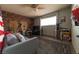 Modern bedroom featuring hardwood floors, decorated walls, and ample natural light at 6432 Aberdeen Ln, Las Vegas, NV 89107