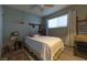 Relaxing bedroom featuring hardwood floors, neutral walls, and ample natural light at 6432 Aberdeen Ln, Las Vegas, NV 89107