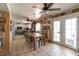 Open-concept dining room area with tile floors, vintage-inspired decor, and lots of space at 6432 Aberdeen Ln, Las Vegas, NV 89107