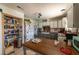 Charming kitchen with pantry, white cabinets, stainless steel appliances, and wood-look countertops at 6432 Aberdeen Ln, Las Vegas, NV 89107
