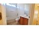 Bright bathroom featuring tub, shower, vanity, and toilet at 6516 Velvet Silk St, North Las Vegas, NV 89084