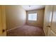 Neutral bedroom featuring carpet, window, and natural light at 6516 Velvet Silk St, North Las Vegas, NV 89084
