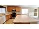 Bright and functional kitchen with a center island, stainless steel appliances, and ample countertop space at 6516 Velvet Silk St, North Las Vegas, NV 89084