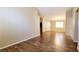 Open living room with wood flooring and great natural light at 6516 Velvet Silk St, North Las Vegas, NV 89084
