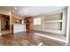 Open concept living space with hardwood floors, recessed lighting, and easy access to the kitchen and dining area at 6516 Velvet Silk St, North Las Vegas, NV 89084