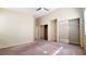 Spacious main bedroom featuring ceiling fan, closet and natural light at 6516 Velvet Silk St, North Las Vegas, NV 89084