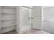 Shower room includes built in shelves, glass shower and white subway tiles at 6743 Violet Cascade Ave, Las Vegas, NV 89156