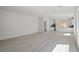 Spacious open-concept living area with light wood floors and abundant natural light at 6743 Violet Cascade Ave, Las Vegas, NV 89156