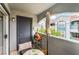 A cozy balcony includes seating, potted plants, and views of the apartment complex at 6955 N Durango Dr # 3013, Las Vegas, NV 89149