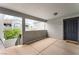 Inviting condo entrance featuring covered patio and secure front door in a well-maintained building at 6955 N Durango Dr # 3013, Las Vegas, NV 89149