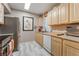 Functional kitchen featuring stainless steel appliances, ample cabinet space, and bright countertops at 6955 N Durango Dr # 3013, Las Vegas, NV 89149