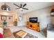 Bright living room with ceiling fan, media center, and contemporary decor at 6955 N Durango Dr # 3013, Las Vegas, NV 89149