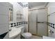 Bathroom with tub, shower, and tile pattern at 704 Kings Ave, North Las Vegas, NV 89030