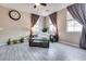 Cozy living room with tile flooring, comfortable seating, and natural light streaming in from the windows at 9112 Canoga Canyon Ct # 103, Las Vegas, NV 89149