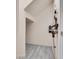 An under-stair storage closet with blue-grey tile flooring and neutral colored walls at 9112 Canoga Canyon Ct # 103, Las Vegas, NV 89149