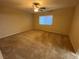 Cozy bedroom features a ceiling fan and a bright window with blinds, creating a peaceful space at 10537 Thor Mountain Ln, Las Vegas, NV 89166