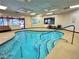 Indoor spa featuring a relaxing hot tub area with a lounge and a view of the outdoors at 10646 Heritage Hills Dr, Las Vegas, NV 89134
