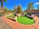 A well-maintained miniature golf course, perfect for leisurely recreation with neatly trimmed green turf at 10646 Heritage Hills Dr, Las Vegas, NV 89134