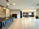 Bright and airy open floor plan, connecting the living area, kitchen, and game room at 10719 Hammett Park Ave, Las Vegas, NV 89166
