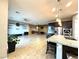 Spacious open-concept living space with a modern kitchen, and ample space for entertaining at 10719 Hammett Park Ave, Las Vegas, NV 89166