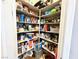 Walk-in pantry featuring several shelves for optimized storage and organization at 10719 Hammett Park Ave, Las Vegas, NV 89166