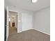 Bedroom offers carpet flooring, white walls and closet space at 1109 Claire Rose Ave, Las Vegas, NV 89183