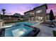 Stunning backyard with a pool, spa, lounge chairs, and an outdoor dining area at 12637 Penfield Ave, Las Vegas, NV 89138