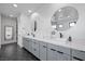 Contemporary bathroom with double sinks, stylish fixtures, and a sleek design at 12637 Penfield Ave, Las Vegas, NV 89138