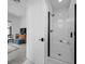 Contemporary bathroom with frameless glass shower, white tile, and modern fixtures at 12637 Penfield Ave, Las Vegas, NV 89138