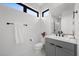 Modern bathroom features a sleek vanity, contemporary fixtures, and ample natural light at 12637 Penfield Ave, Las Vegas, NV 89138