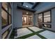 Contemporary courtyard with modern landscaping, pavers, and unique architectural features at 12637 Penfield Ave, Las Vegas, NV 89138