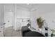 Well-lit laundry room features modern washer, dryer, cabinets, and sleek sink at 12637 Penfield Ave, Las Vegas, NV 89138