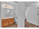 Bathroom with well-lit vanity, toilet and vinyl flooring at 1300 S Arlington St # 120, Las Vegas, NV 89104