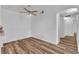 Bright bedroom with wood floors, a ceiling fan and an air conditioning unit at 1300 S Arlington St # 120, Las Vegas, NV 89104