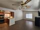 Open-concept floor plan connecting the living room to the kitchen area at 2106 Pebble Creek Ln, Laughlin, NV 89029
