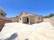 Home's enclosed backyard with landscaping, hardscape, and a covered patio at 2119 Sunset Vista Ave, Henderson, NV 89052