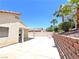 Home's backyard with hardscape, landscaping, and a covered patio at 2119 Sunset Vista Ave, Henderson, NV 89052