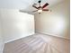 Bedroom features neutral carpet, a ceiling fan, and neutral paint at 2119 Sunset Vista Ave, Henderson, NV 89052