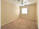 Bright bedroom features neutral walls, carpet, and a ceiling fan at 2119 Sunset Vista Ave, Henderson, NV 89052