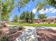 Beautiful community park with lush grass, walking path, and gazebo, perfect for relaxation at 2119 Sunset Vista Ave, Henderson, NV 89052