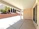 Covered patio overlooks block fence and desert landscaped backyard at 2119 Sunset Vista Ave, Henderson, NV 89052