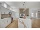 Bright kitchen with a marble island, stainless steel appliances, and modern cabinets at 2353 Lauren Dr, Las Vegas, NV 89134
