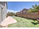 This backyard features a putting green, small pool with rock detail, and patio area at 2367 Tilden Way, Henderson, NV 89074