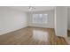 Bright bedroom boasting hardwood floors, a window, and ample space at 2367 Tilden Way, Henderson, NV 89074
