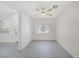 Bright bedroom featuring light-gray floors, ceiling fan and natural light at 2367 Tilden Way, Henderson, NV 89074