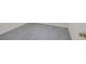 Close-up of the grey-toned wood-look flooring and baseboards at 2367 Tilden Way, Henderson, NV 89074
