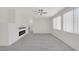 Spacious living room featuring an electric fireplace and neutral color palette at 2367 Tilden Way, Henderson, NV 89074