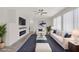Inviting living area with plush seating, stylish decor, fireplace, and media setup at 2367 Tilden Way, Henderson, NV 89074