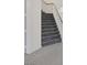 Carpeted stairway features white railings and light-colored wood handrail at 2367 Tilden Way, Henderson, NV 89074